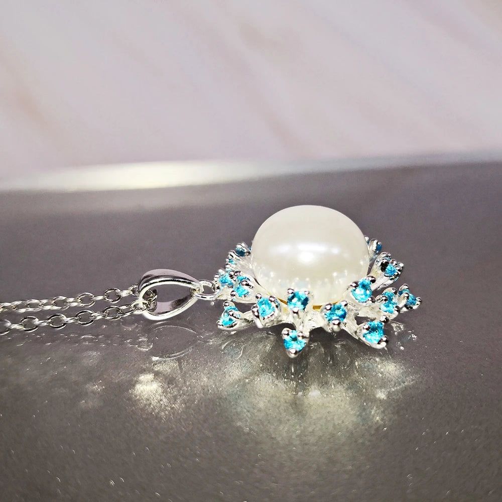 Aquamarine Elegance: Dreamcarnival Silver Plated Sweater Necklace with White Pearl Pendant