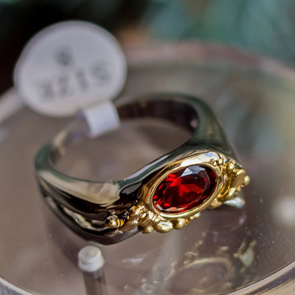 Bold Red Cubic Zirconia Geometric Cocktail Ring in Black-Gold Finish