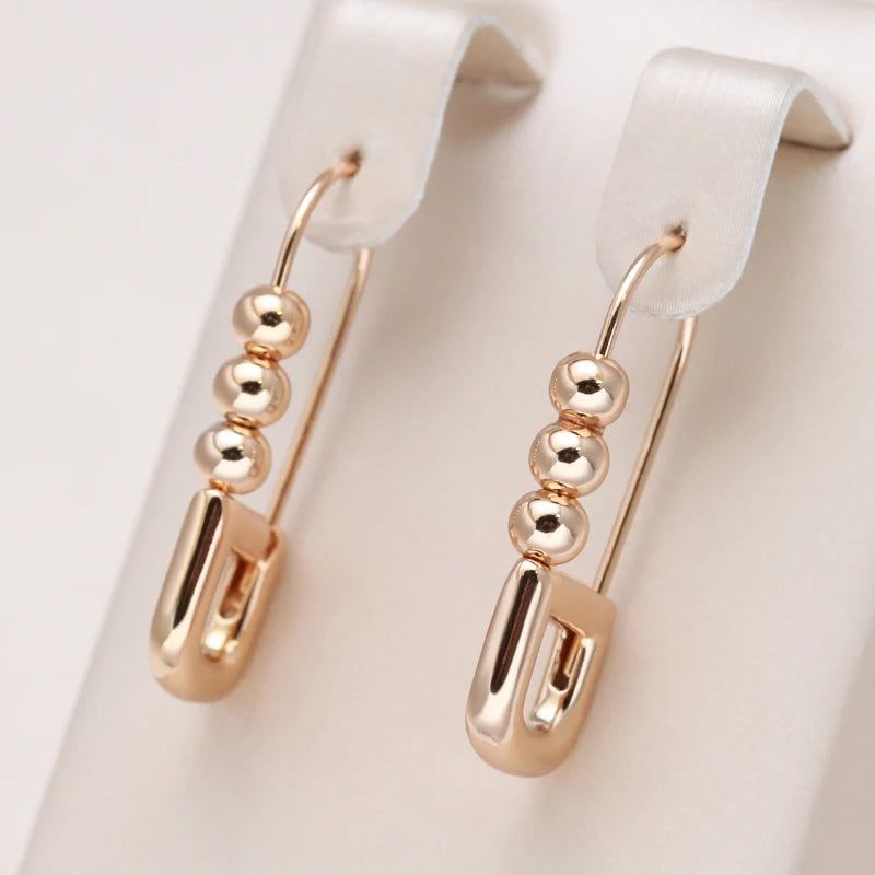 Classic Rose Gold Geometric Dangle Earrings with Glossy Finish – High-Quality Jewelry