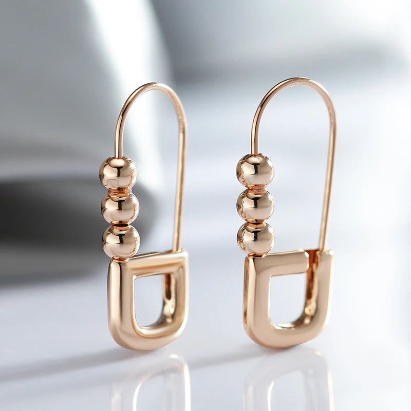 Classic Rose Gold Geometric Dangle Earrings with Glossy Finish – High-Quality Jewelry