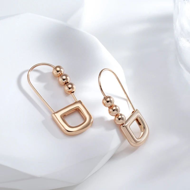 Classic Rose Gold Geometric Dangle Earrings with Glossy Finish – High-Quality Jewelry