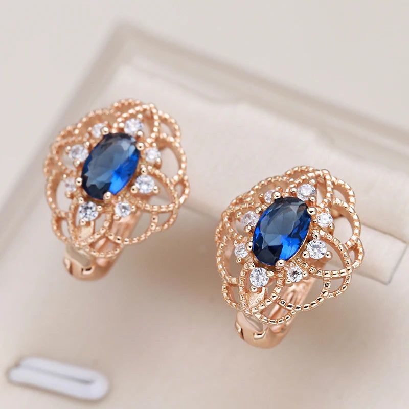 Contemporary Blue Zircon Floral Drop Earrings in Rose Gold Finish