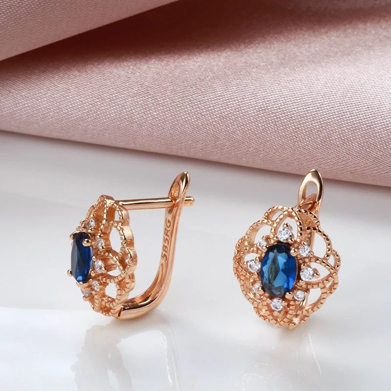 Contemporary Blue Zircon Floral Drop Earrings in Rose Gold Finish