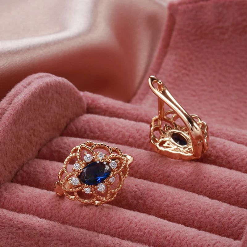 Contemporary Blue Zircon Floral Drop Earrings in Rose Gold Finish