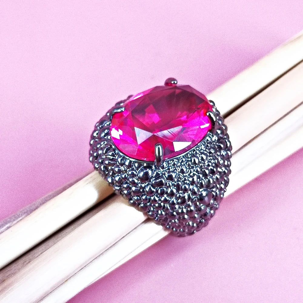 Dazzling Fuchsia Zirconia Cocktail Ring with Bold Black Lizard Design