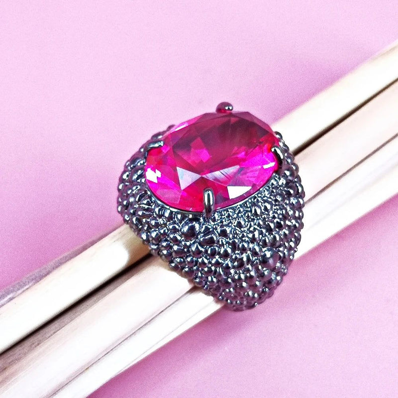 Dazzling Fuchsia Zirconia Cocktail Ring with Bold Black Lizard Design