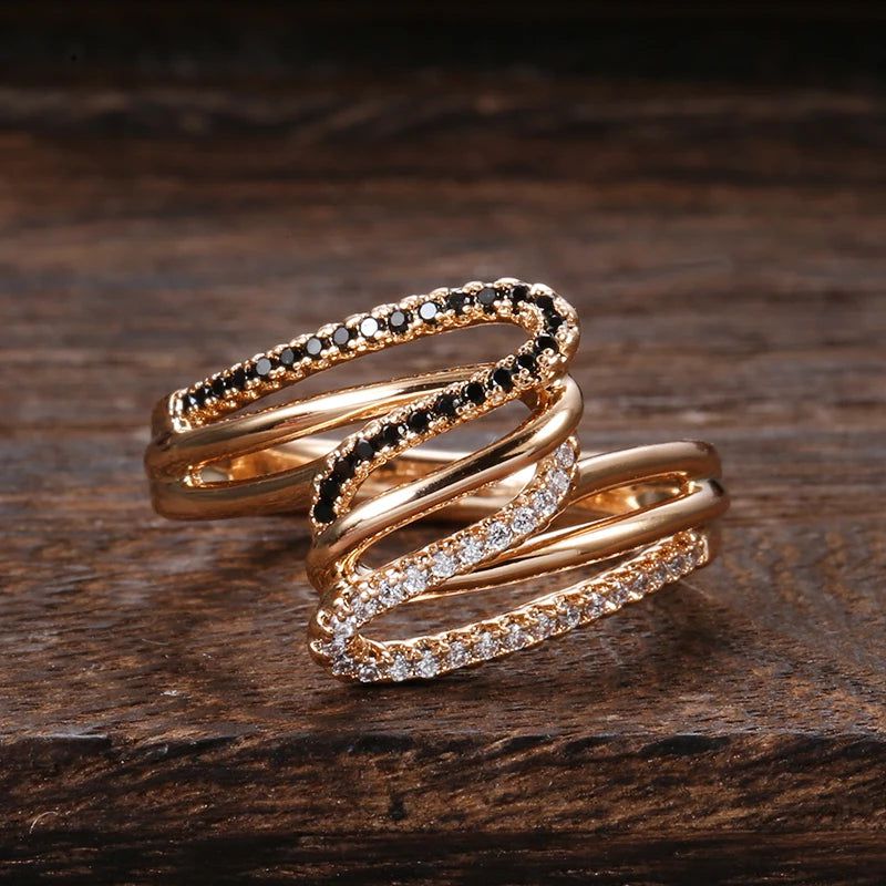 Dignified 585 Rose Gold Twisted Cocktail Ring with Micro Paved Black & White Zircon