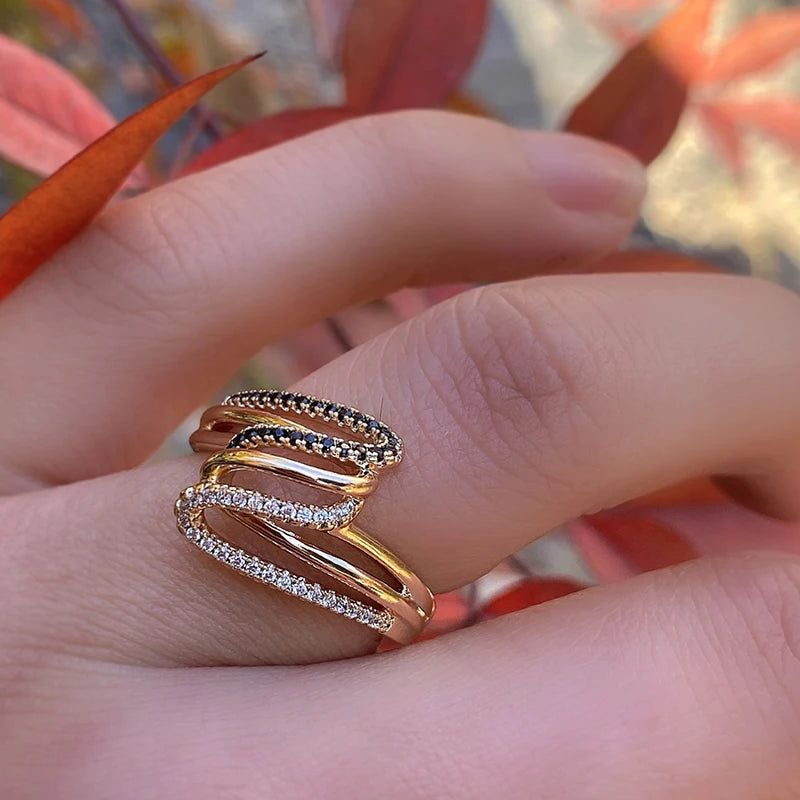 Dignified 585 Rose Gold Twisted Cocktail Ring with Micro Paved Black & White Zircon