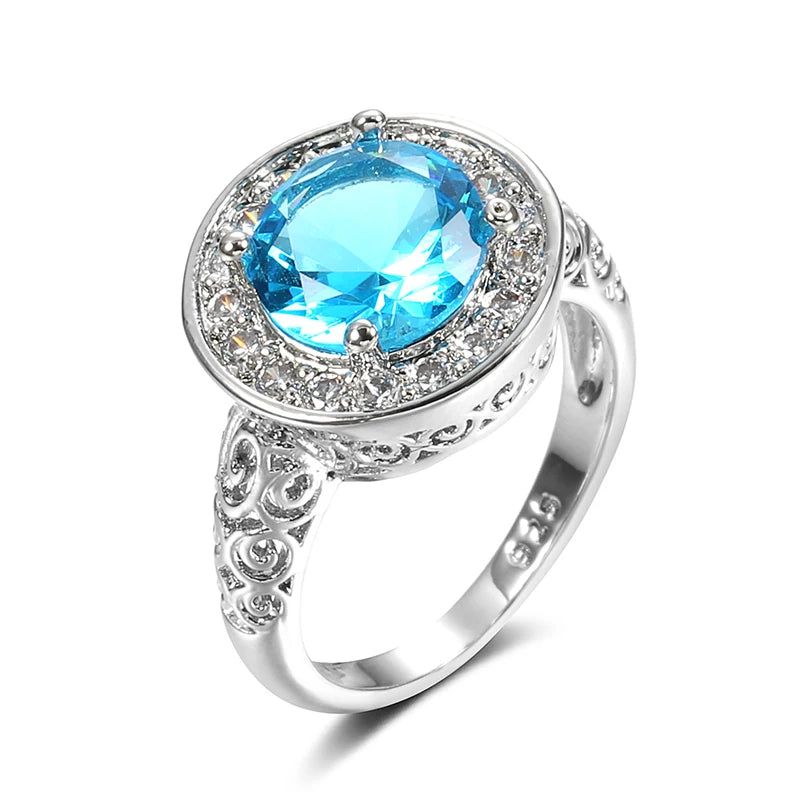 Elaborate Blue Natural Zircon Ring in 585 Rose Gold with Hollow Floral Design and Crystal Accents