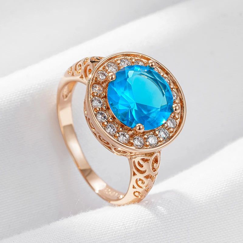 Elaborate Blue Natural Zircon Ring in 585 Rose Gold with Hollow Floral Design and Crystal Accents