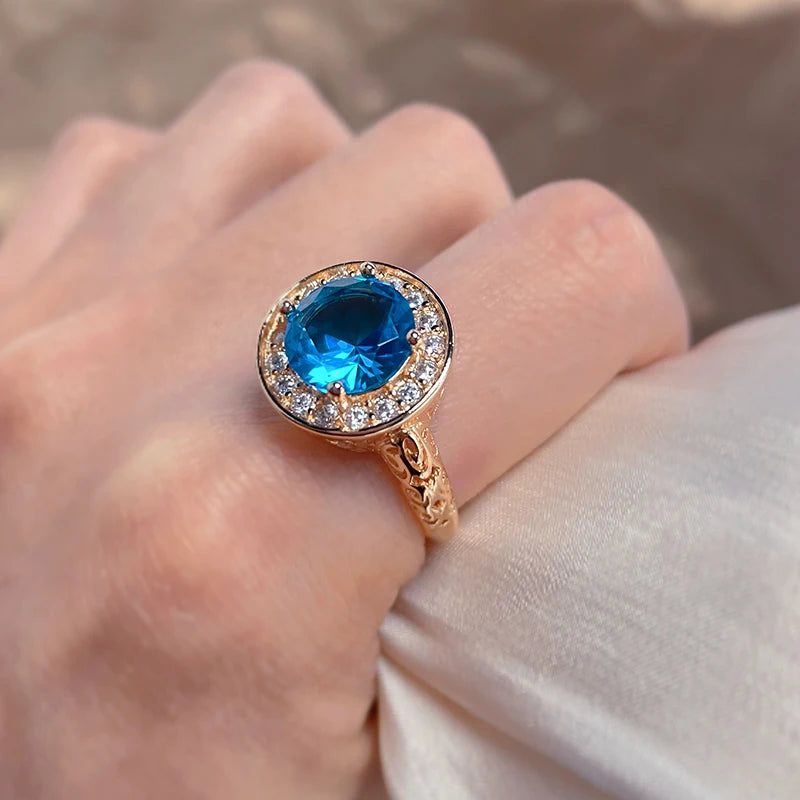 Elaborate Blue Natural Zircon Ring in 585 Rose Gold with Hollow Floral Design and Crystal Accents