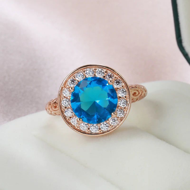 Elaborate Blue Natural Zircon Ring in 585 Rose Gold with Hollow Floral Design and Crystal Accents