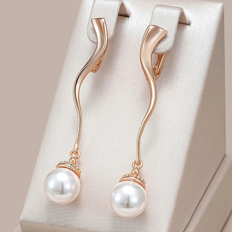 Elaborate Geometric Pearl Drop Earrings in Luxurious 585 Rose Gold for Brides and Special Occasions