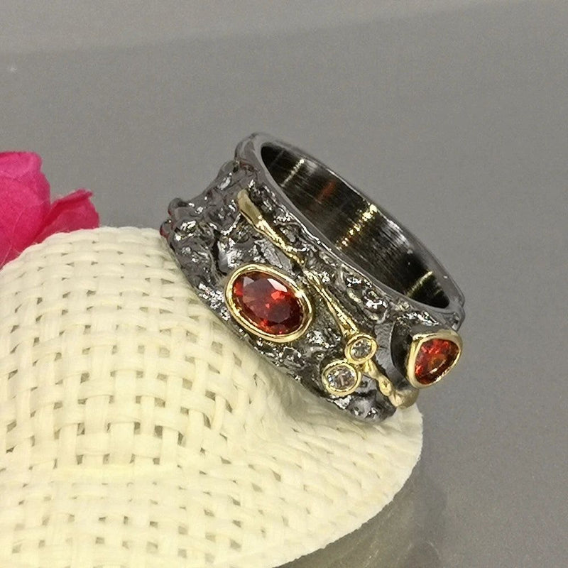 Elegant Baroque-Inspired Black Gold Ring with Red CZ for a Unique Style