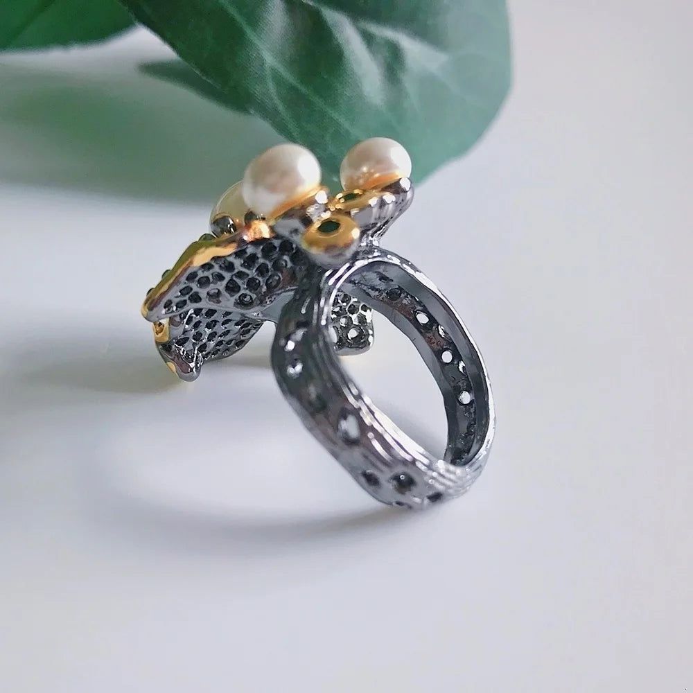 Elegant Blooming Floral Pearl Ring with Green Zirconia in Black Gold Design