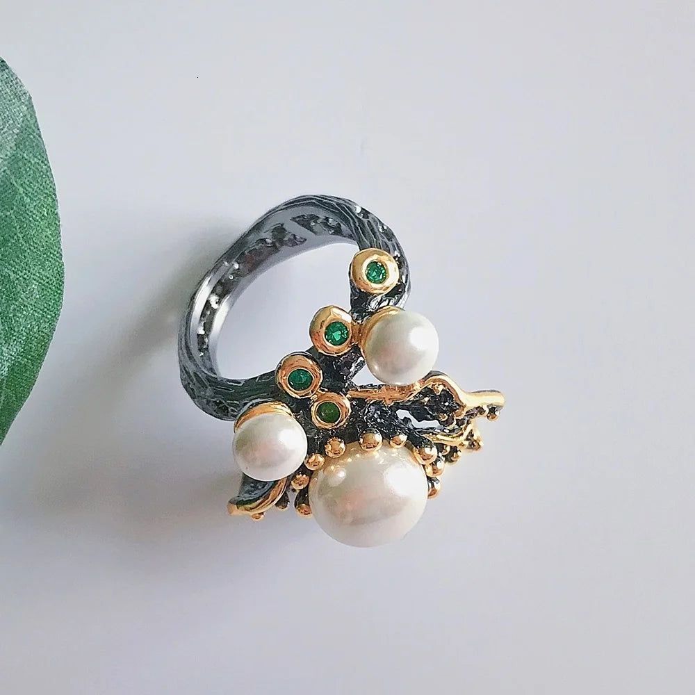 Elegant Blooming Floral Pearl Ring with Green Zirconia in Black Gold Design