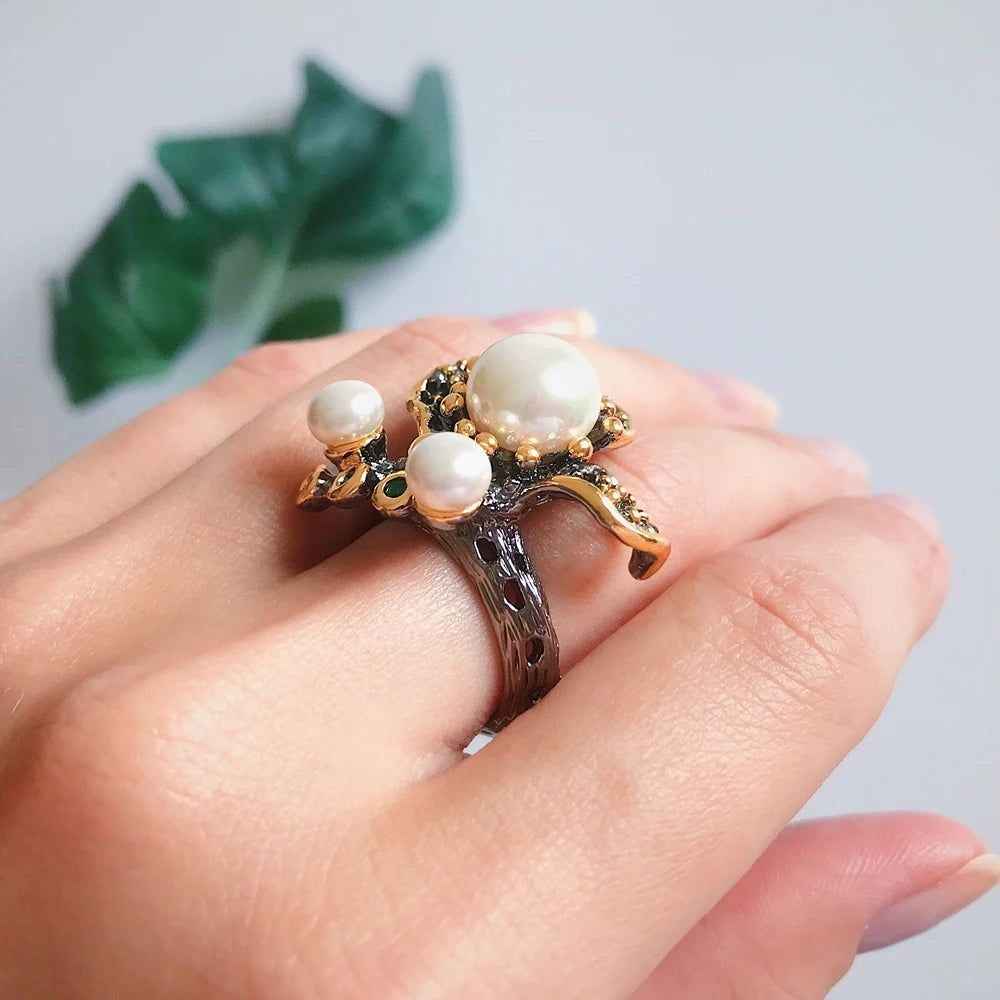 Elegant Blooming Floral Pearl Ring with Green Zirconia in Black Gold Design