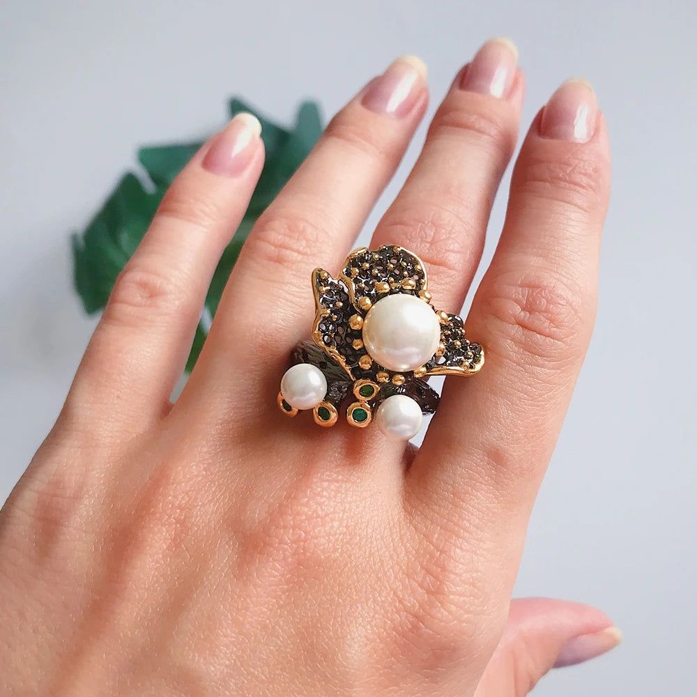 Elegant Blooming Floral Pearl Ring with Green Zirconia in Black Gold Design