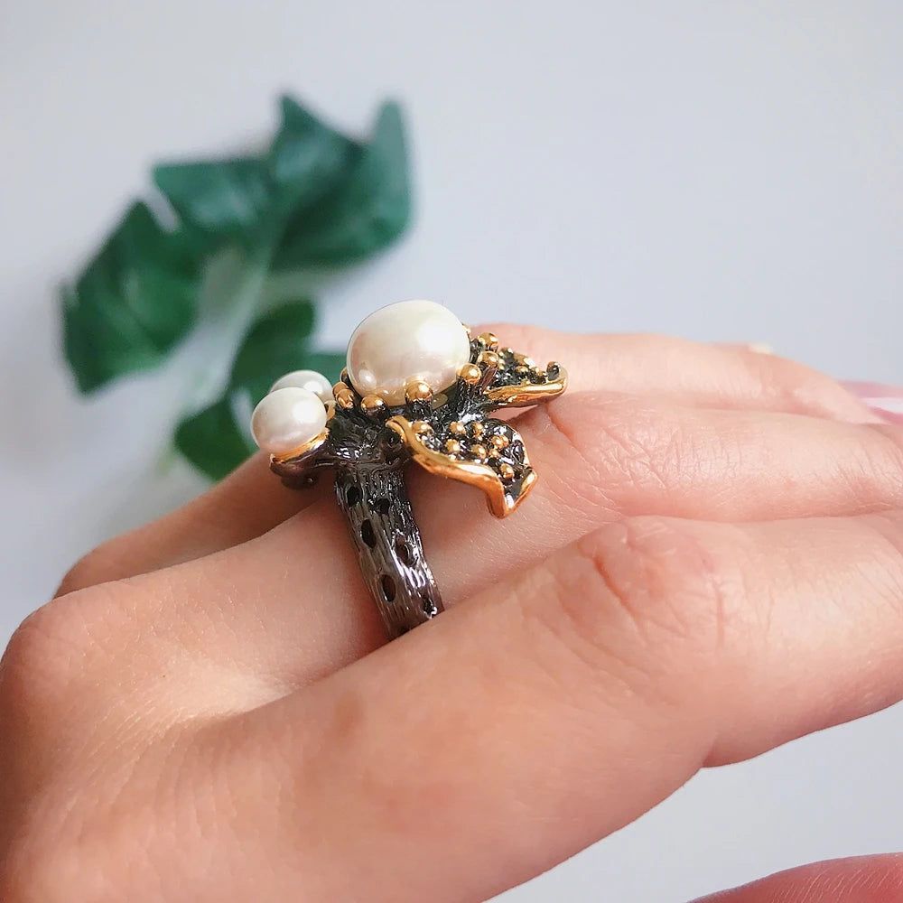 Elegant Blooming Floral Pearl Ring with Green Zirconia in Black Gold Design