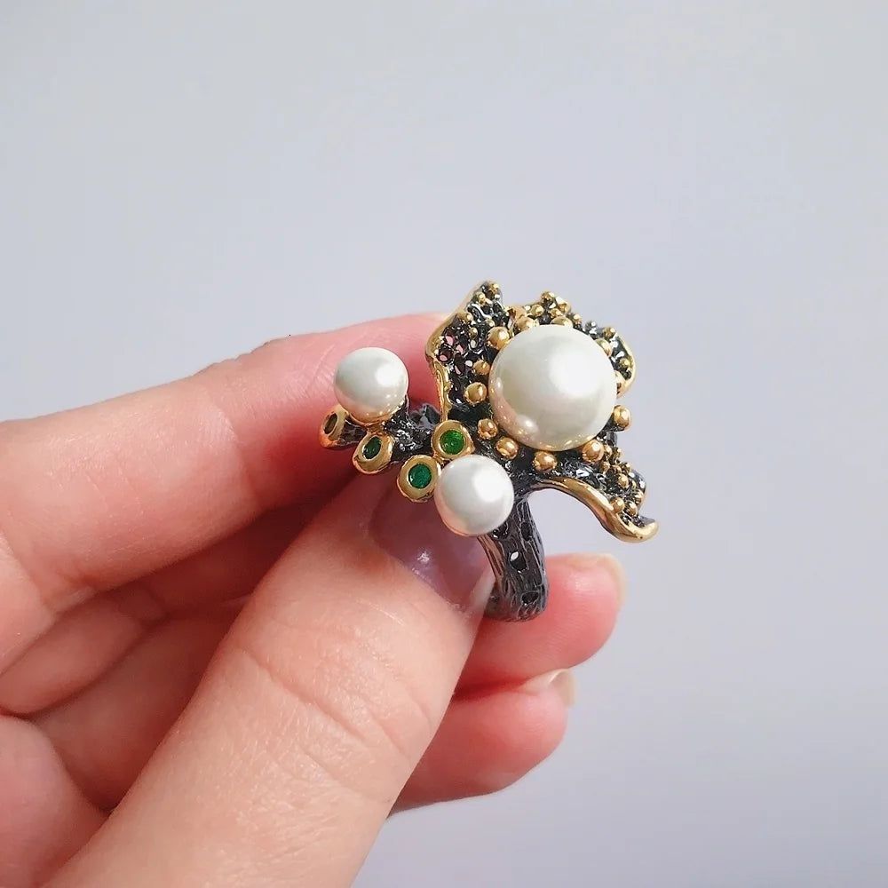 Elegant Blooming Floral Pearl Ring with Green Zirconia in Black Gold Design