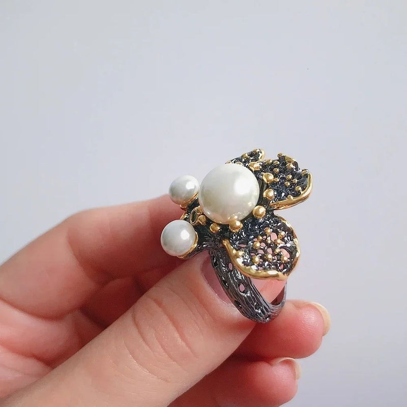 Elegant Blooming Floral Pearl Ring with Green Zirconia in Black Gold Design