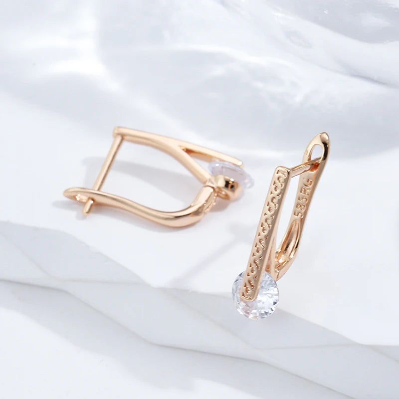 Elegant Emerald Cut Zircon Drop Earrings in 585 Rose Gold with Round Crystal Accents