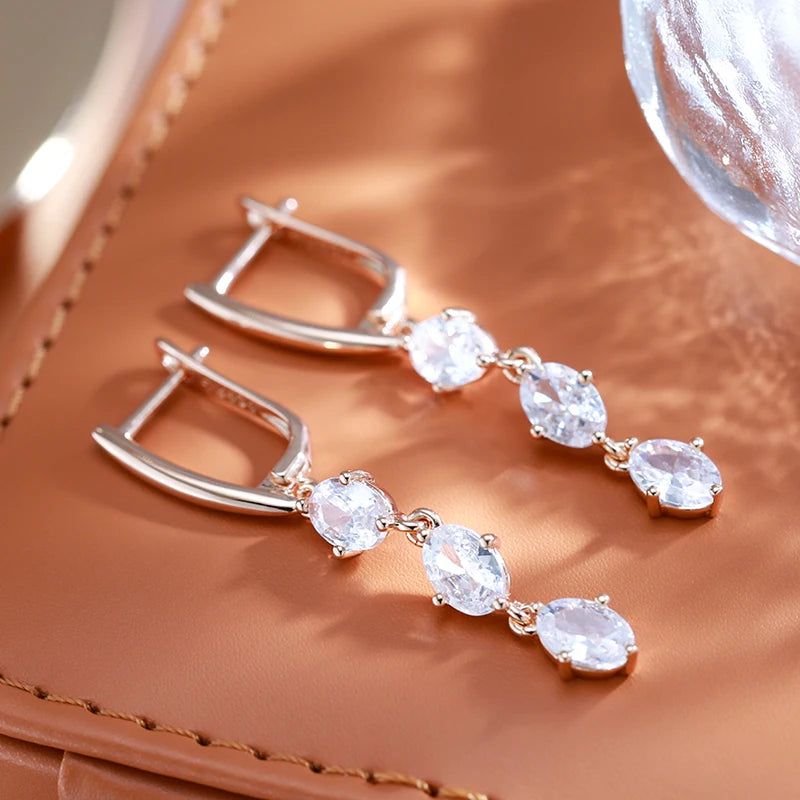 Elegant White Oval Natural Zircon Dangle Earrings in 585 Rose Gold Finish