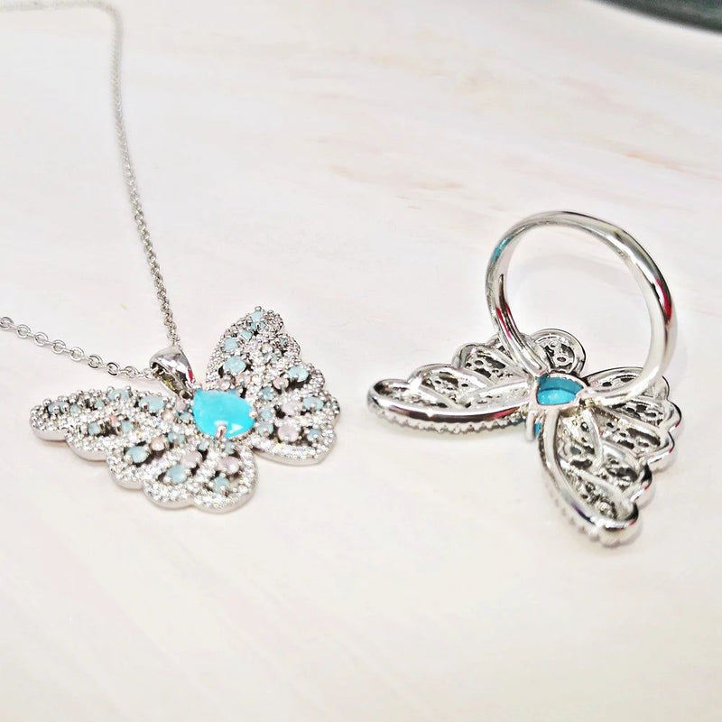 Elegantly Crafted Aquamarine and Pink Opal Butterfly Necklace for Cherished Moments