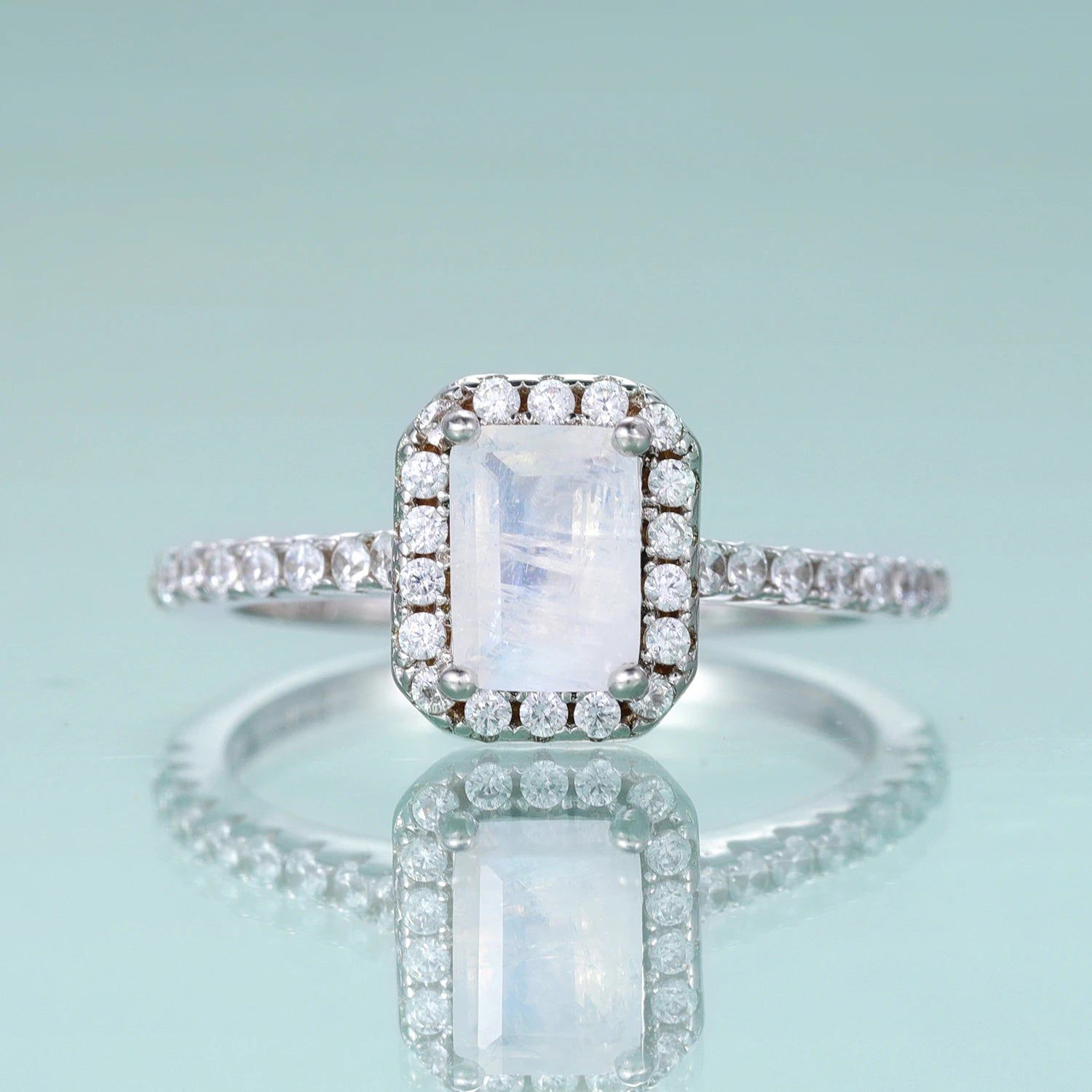 Emerald Cut Milky Blue Moonstone Halo Solitaire Ring