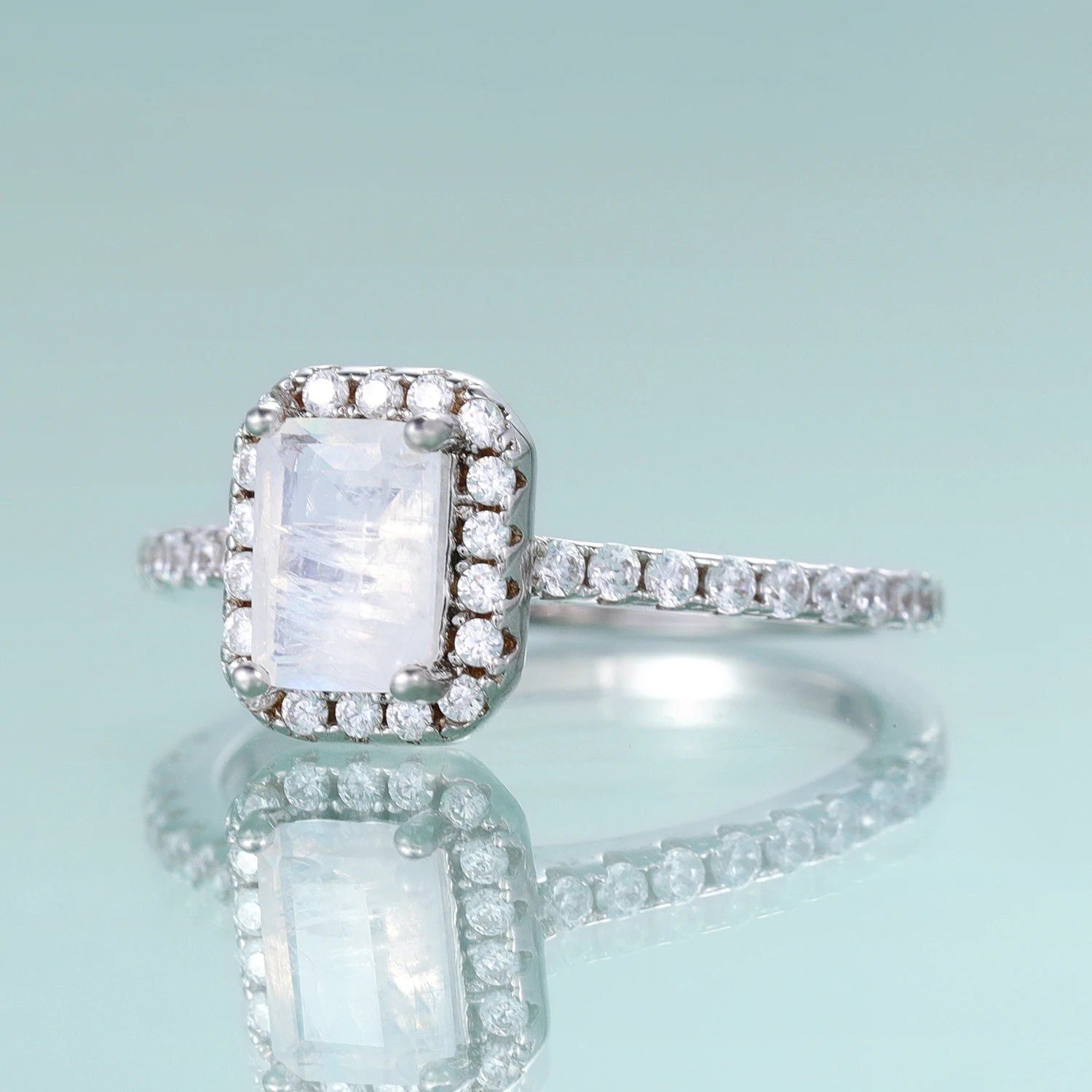 Emerald Cut Milky Blue Moonstone Halo Solitaire Ring