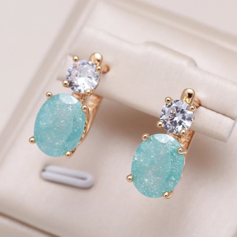 Emerald Elegance: Oval Cut Zircon Drop Earrings in 585 Rose Gold