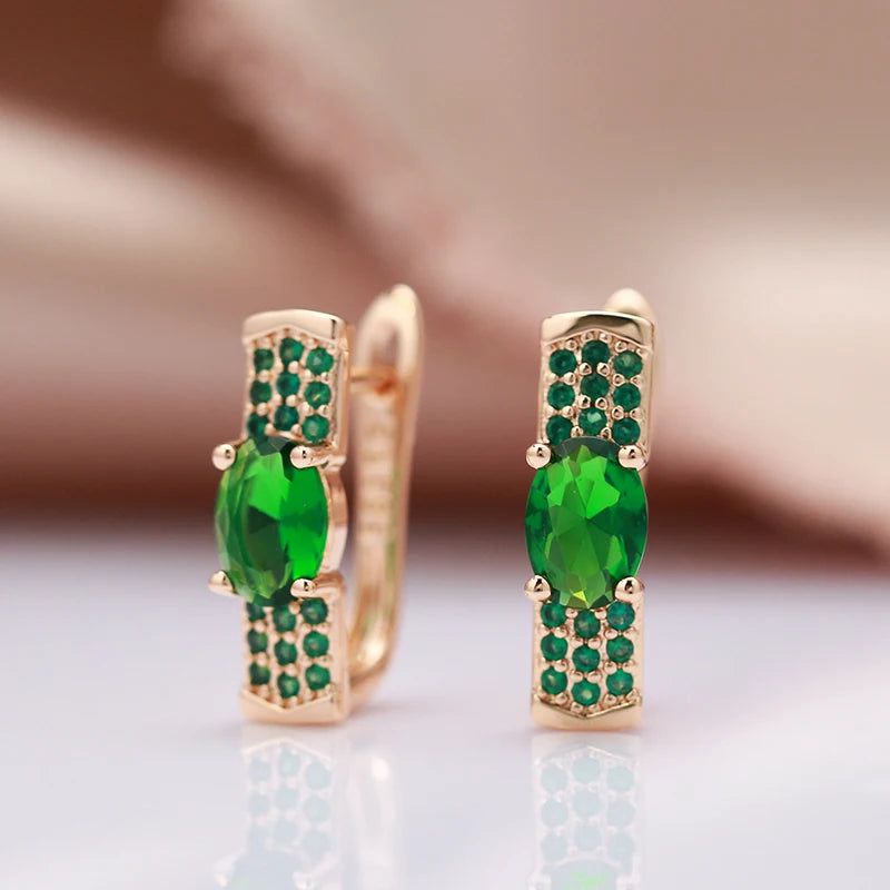 Emerald Elegance: Oval Cut Zircon Drop Earrings in 585 Rose Gold