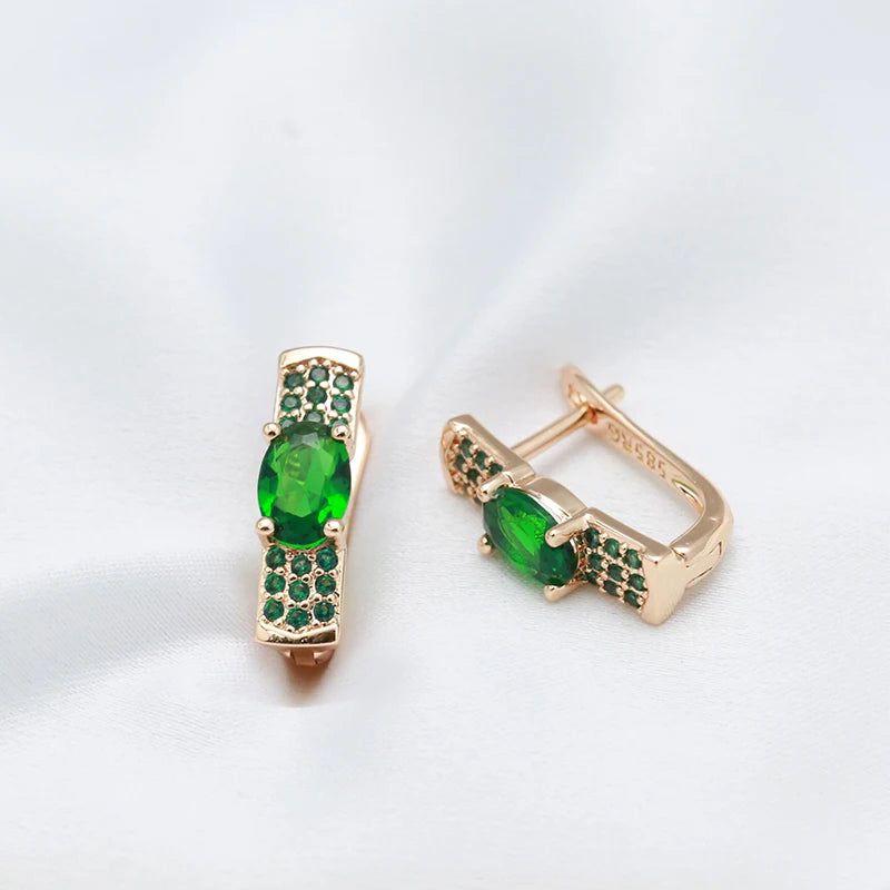 Emerald Elegance: Oval Cut Zircon Drop Earrings in 585 Rose Gold