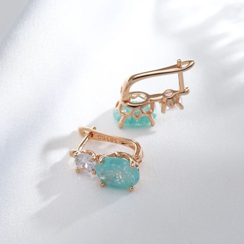 Emerald Elegance: Oval Cut Zircon Drop Earrings in 585 Rose Gold