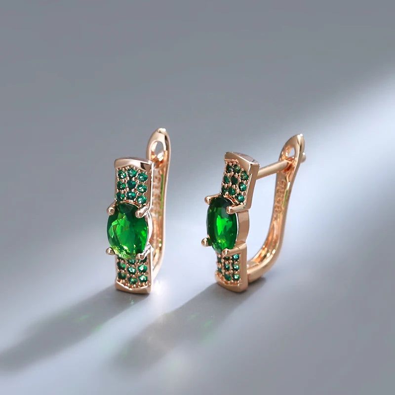 Emerald Elegance: Oval Cut Zircon Drop Earrings in 585 Rose Gold