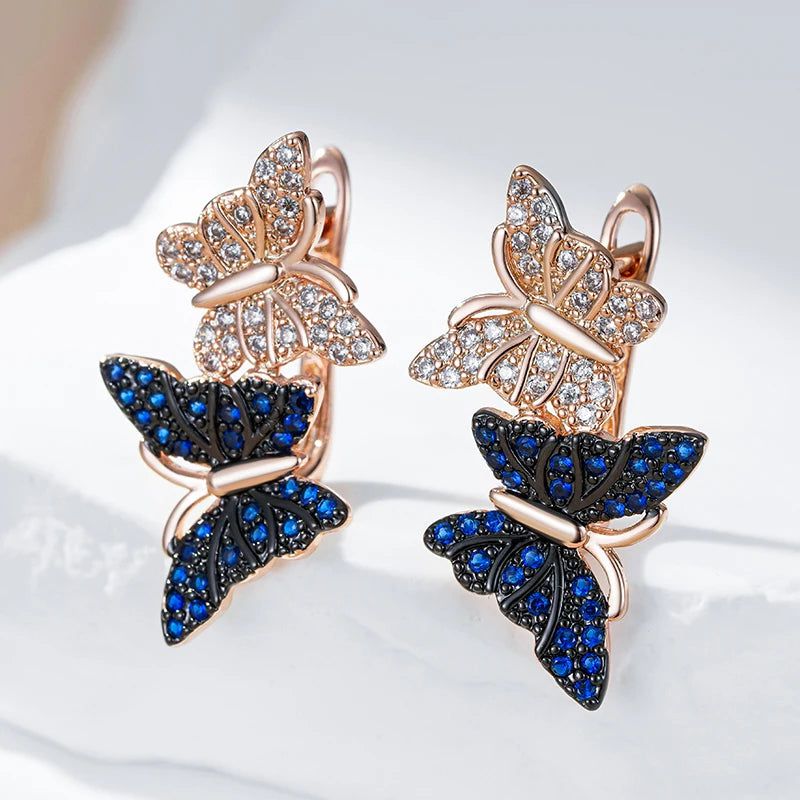 Enchanting Blue Zircon Butterfly Drop Earrings in 585 Rose Gold with Antique Finish