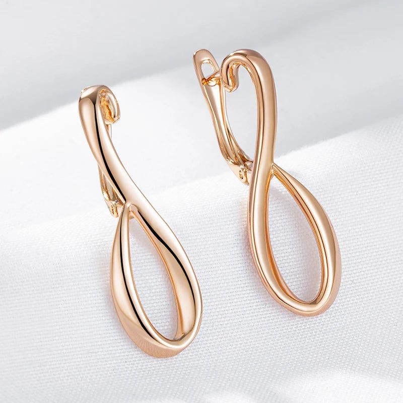 Exquisite 585 Rose Gold Long Drop Earrings - Unique Hollow Metal Design for Elegant Occasions