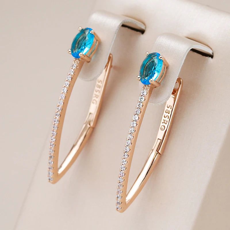 Exquisite Blue Zircon V-Shaped Drop Earrings in 585 Rose Gold - Elegant Holiday Jewelry