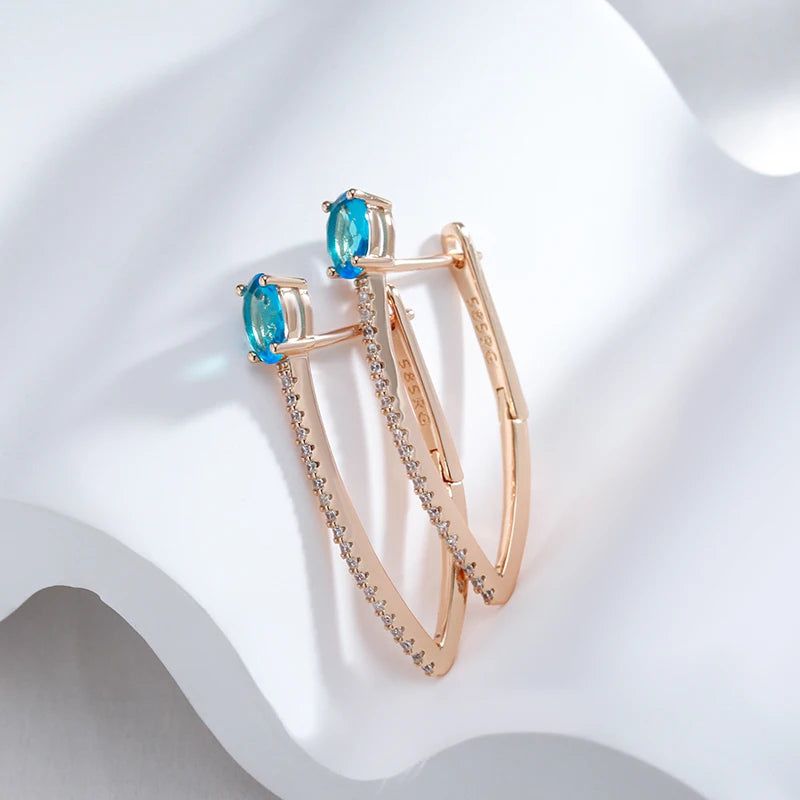 Exquisite Blue Zircon V-Shaped Drop Earrings in 585 Rose Gold - Elegant Holiday Jewelry