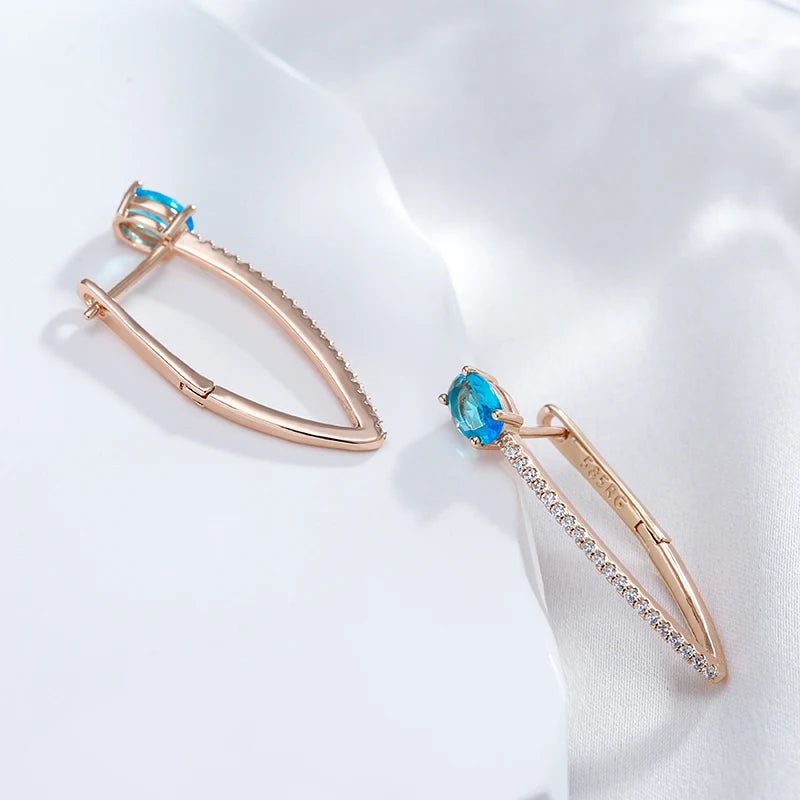 Exquisite Blue Zircon V-Shaped Drop Earrings in 585 Rose Gold - Elegant Holiday Jewelry