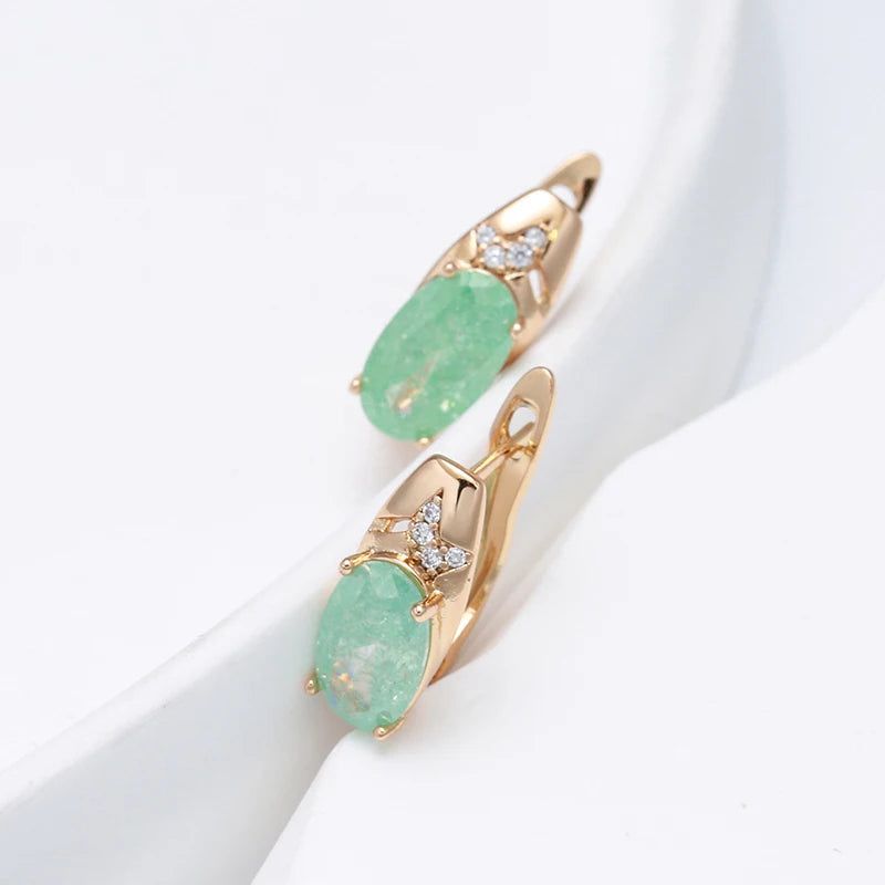 Exquisite Emerald Oval Cut Zircon Drop Earrings in 585 Rose Gold - Luxury Jewelry for Any Occasion