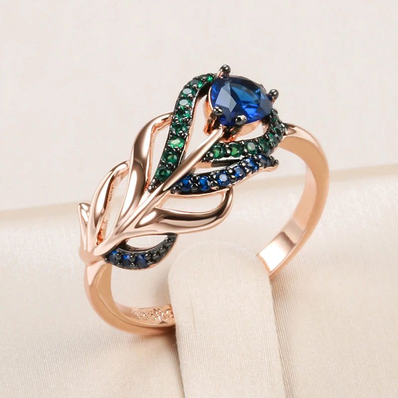 Exquisite Vintage Blue Zircon Ring in 585 Rose Gold with Black Plating and Crystal Leaf Design