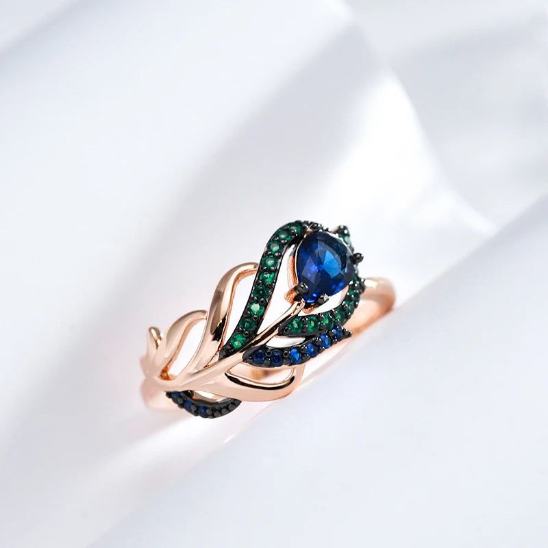 Exquisite Vintage Blue Zircon Ring in 585 Rose Gold with Black Plating and Crystal Leaf Design