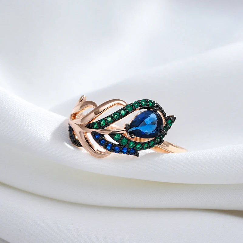 Exquisite Vintage Blue Zircon Ring in 585 Rose Gold with Black Plating and Crystal Leaf Design