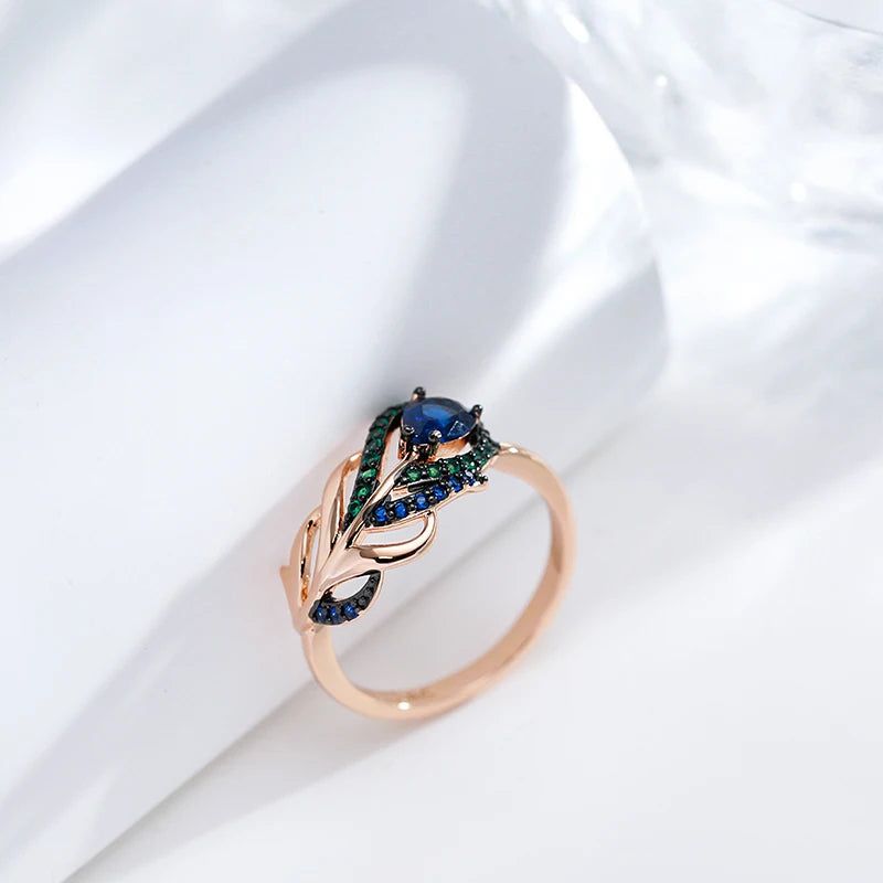 Exquisite Vintage Blue Zircon Ring in 585 Rose Gold with Black Plating and Crystal Leaf Design