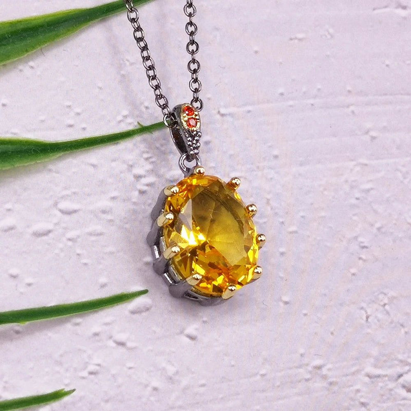 Fashionable Golden Zirconia Egg Pendant Necklace with Dazzling Pronged Design