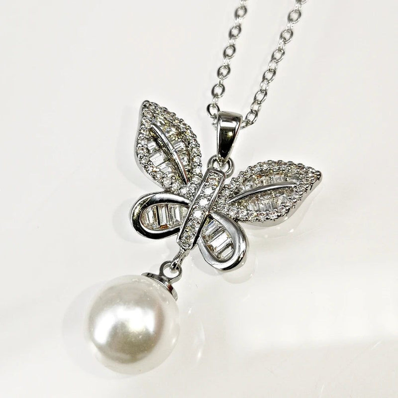 Fashionable Pearl-Embellished Butterfly Pendant Necklace with Zircon Accents