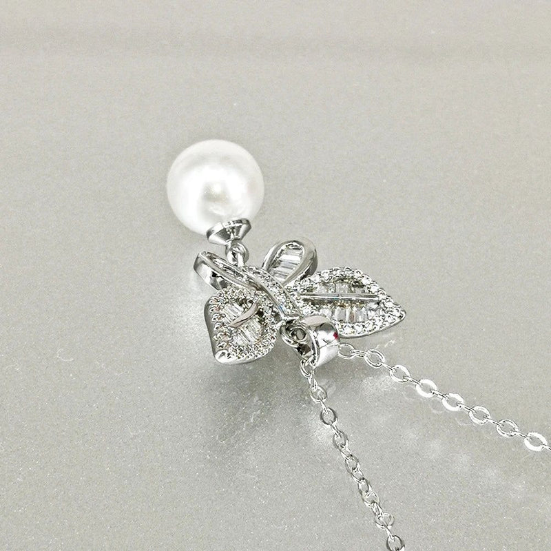 Fashionable Pearl-Embellished Butterfly Pendant Necklace with Zircon Accents