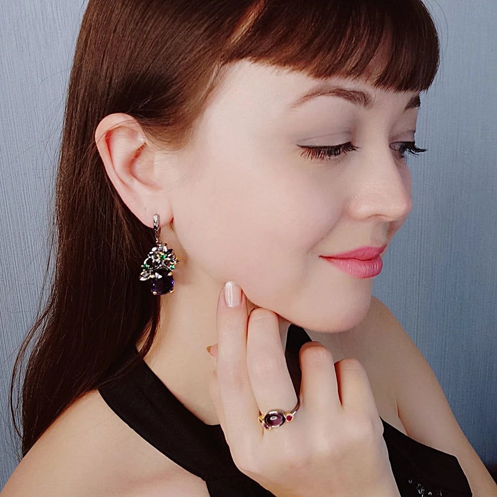 Floral Elegance: Bold Blue CZ Drop Earrings with Gun Black and Gold Accents