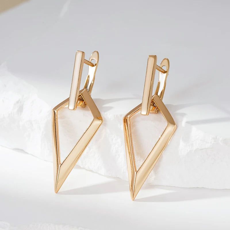 Geometric Elegance: Long Drop Earrings in 585 Rose Gold with Glossy Hollow Design